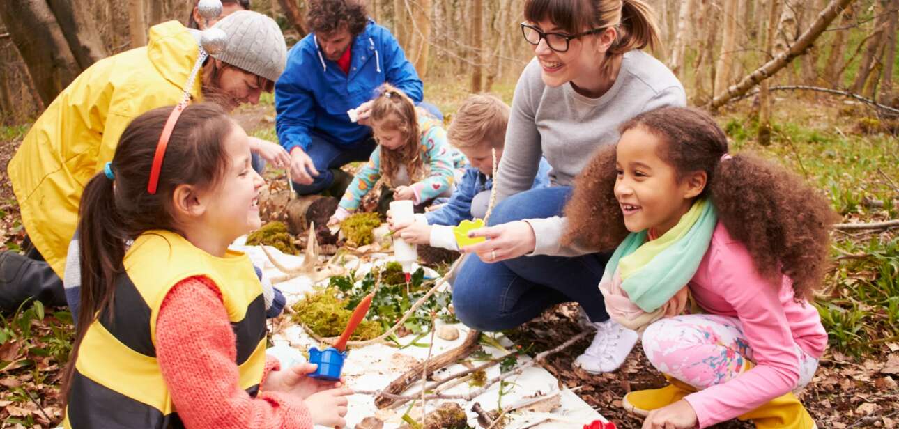 Group of children learning in the outdoors